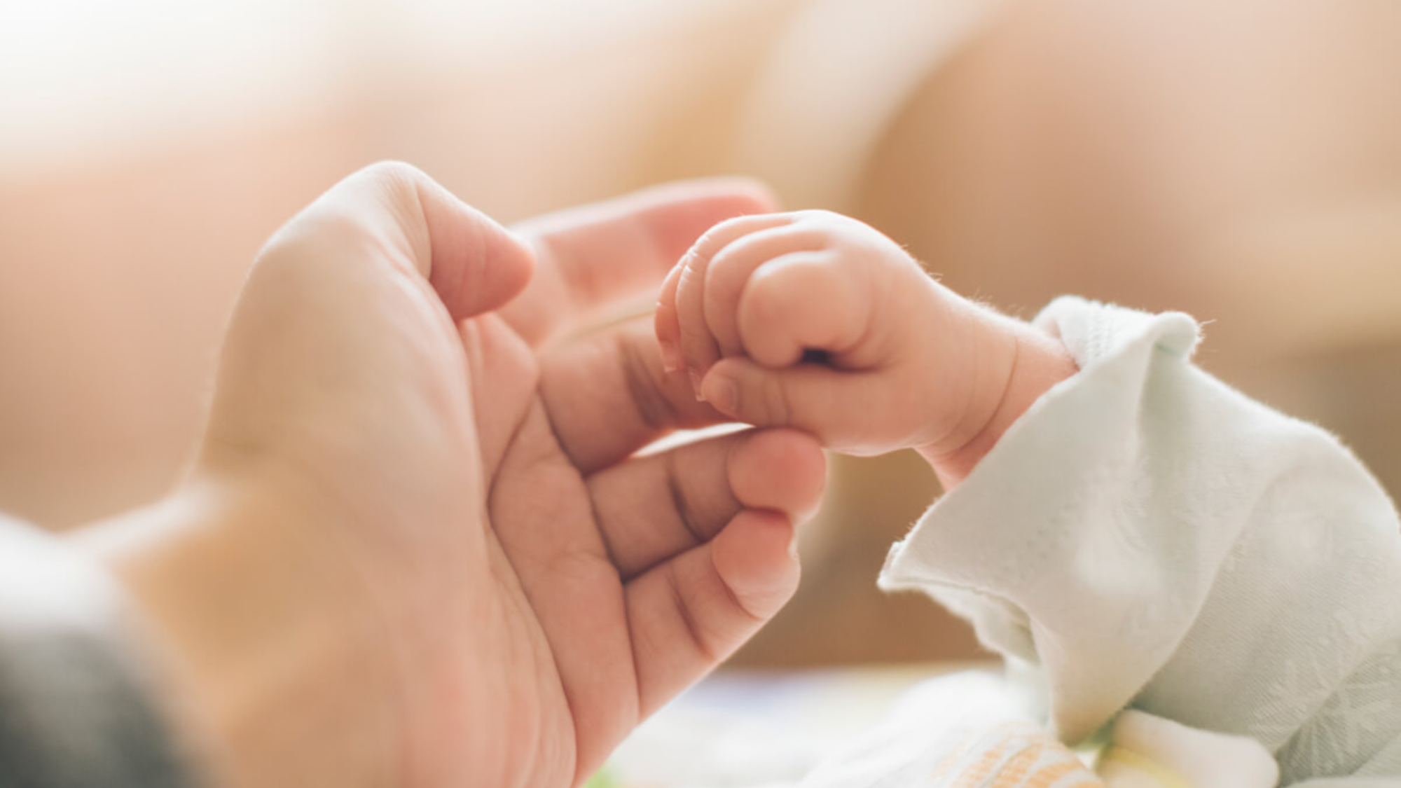 hand with baby 