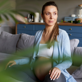 Pregnant woman on couch