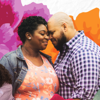 black couple heads together smiling