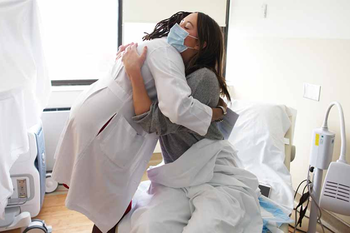 doctor and patient hug
