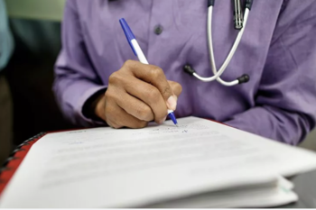 hand holding clipboard 